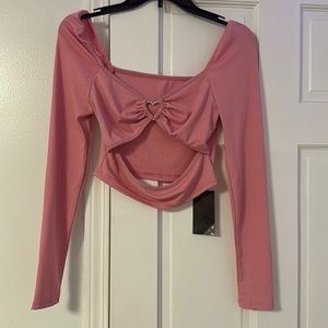 Pink crop top with cutouts